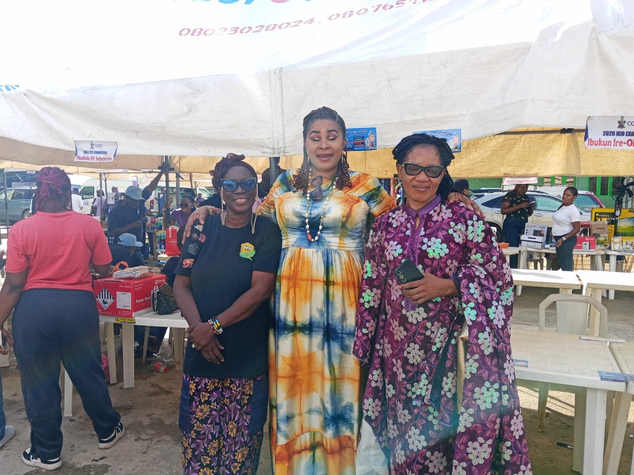 Three members of the cooperative together at the 2026 International Co-operative Day exhibition.
