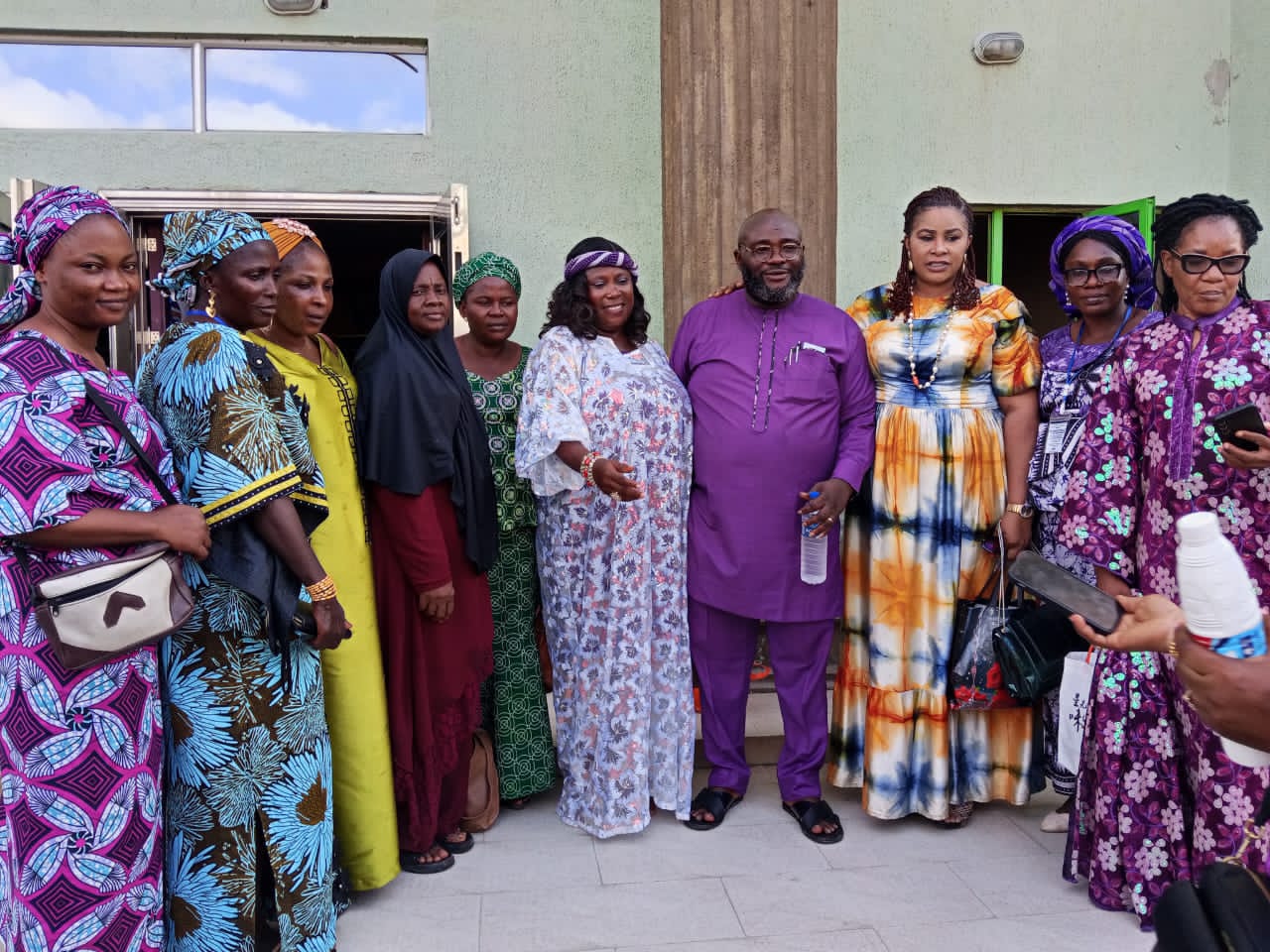 Members of the cooperative and their guests gathered outside a meeting venue.